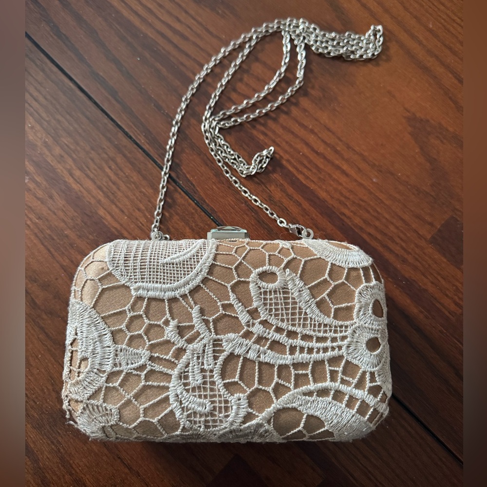 Tan and cream lace clutch